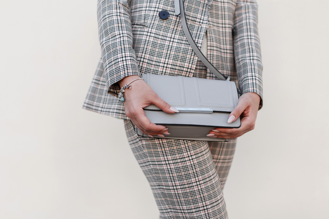 Beautiful Stylish Young Woman with a Fashionable Handbag and Fas