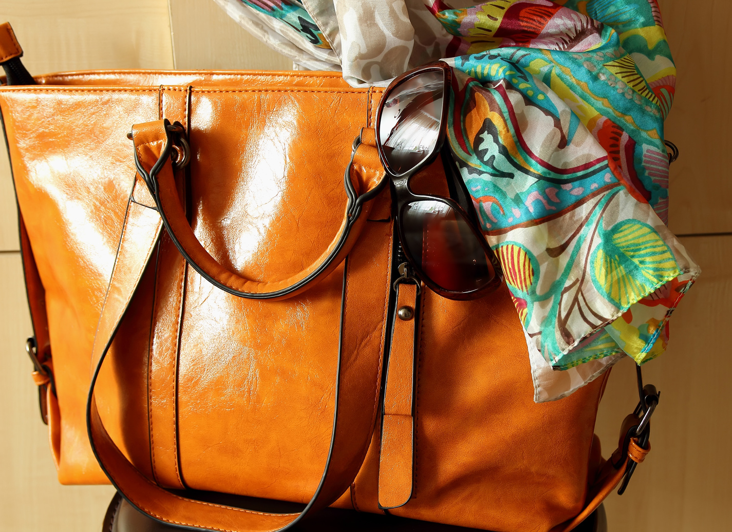 Women's handbags, sunglasses and scarf.